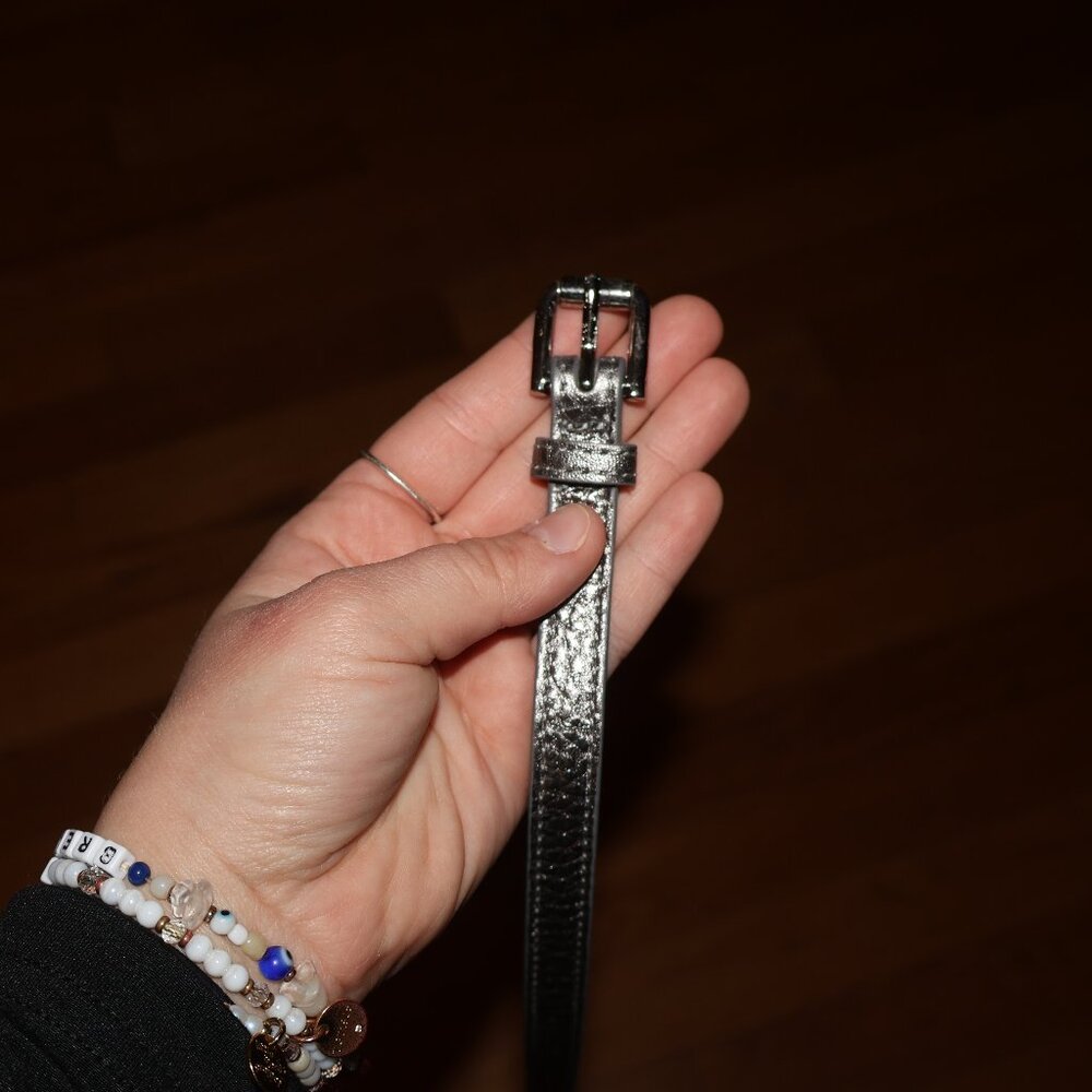 Sliver belt with silver buckle